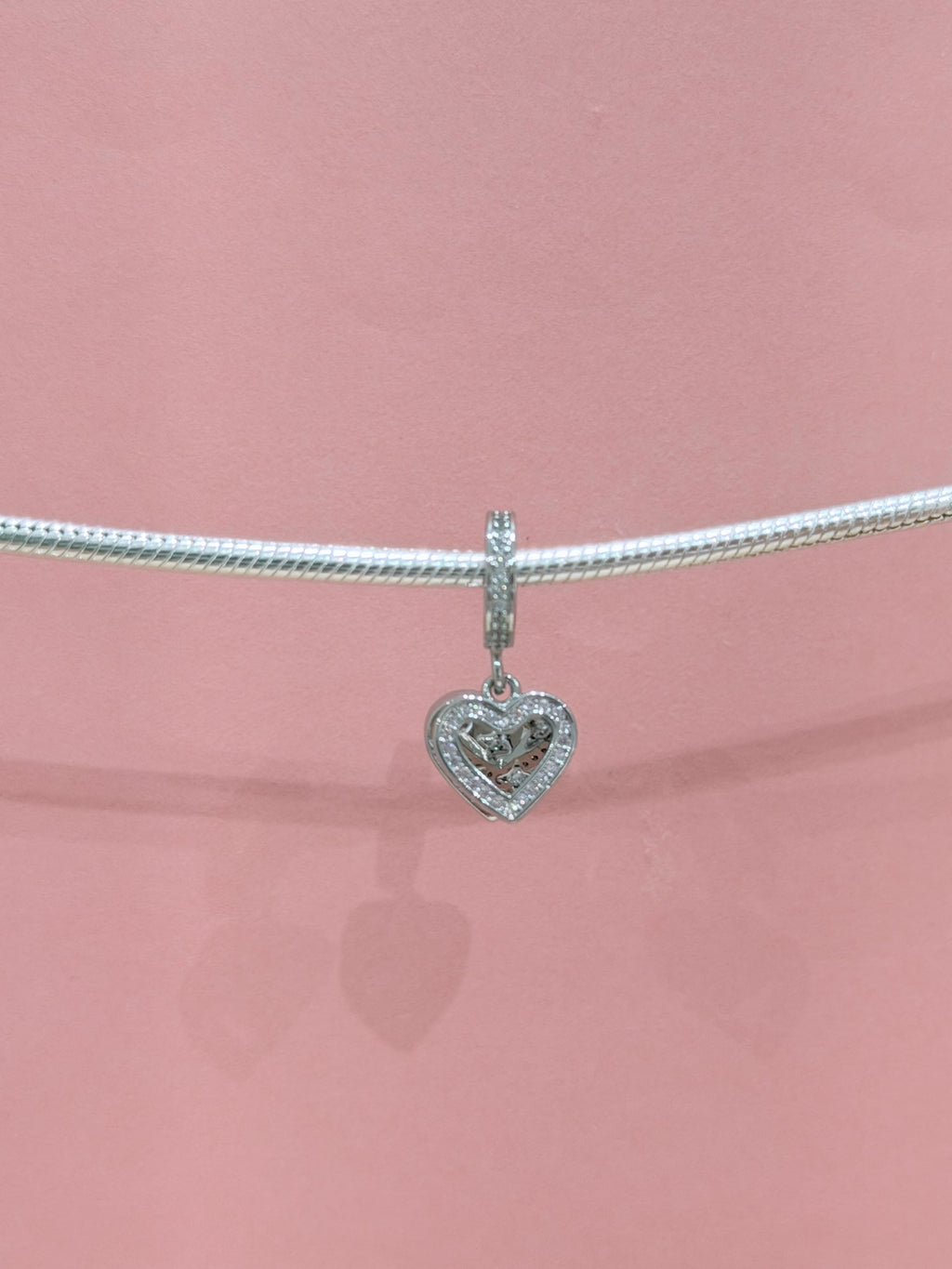 CORAZON PLATEADO CON CORAZON ROSA