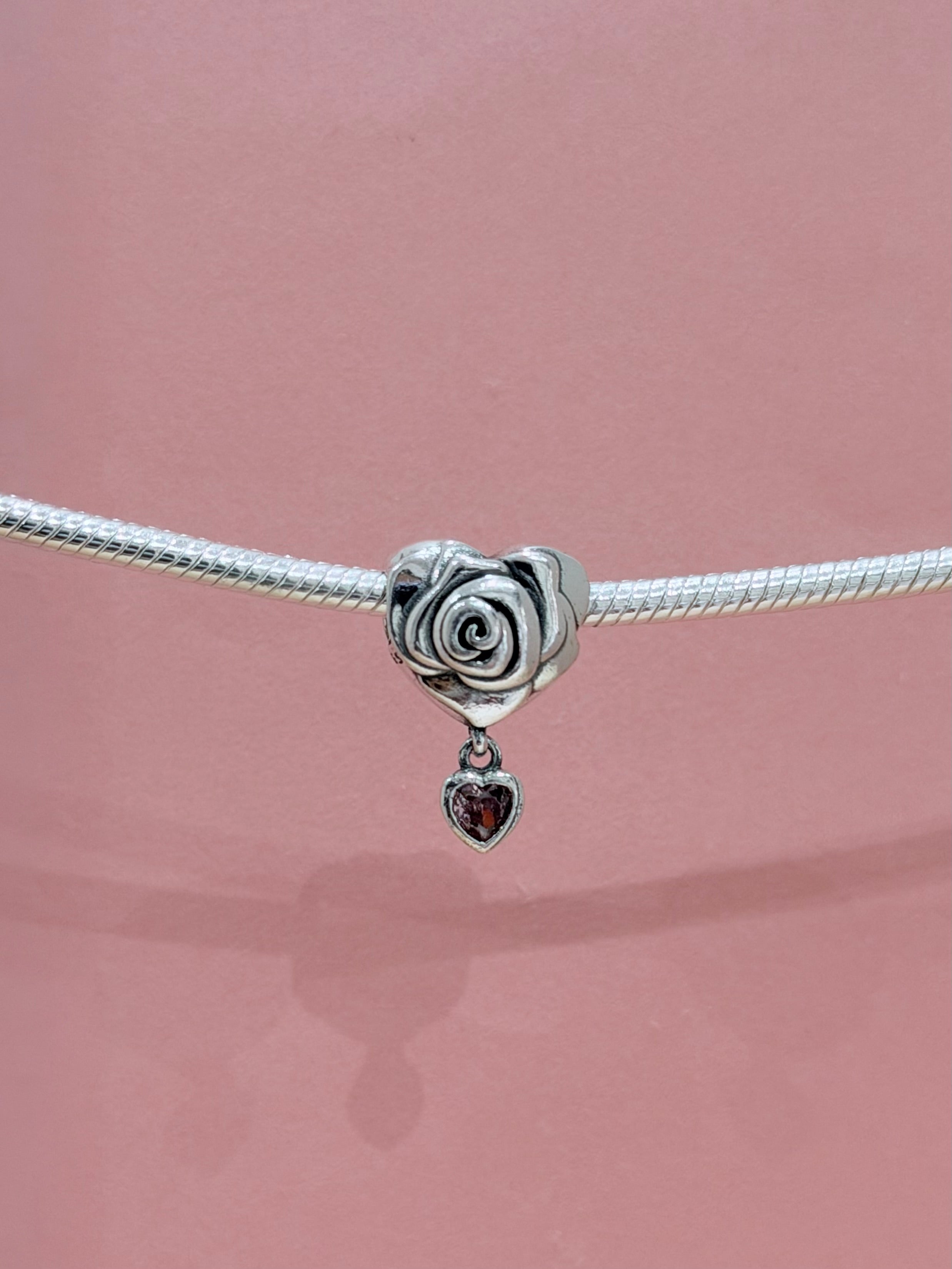 CORAZON CON COLGANTE ROSA